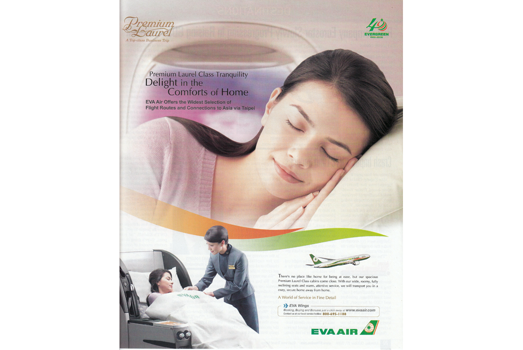  AD - Delight in the comforts of home - woman sleeping in business class seat/bed