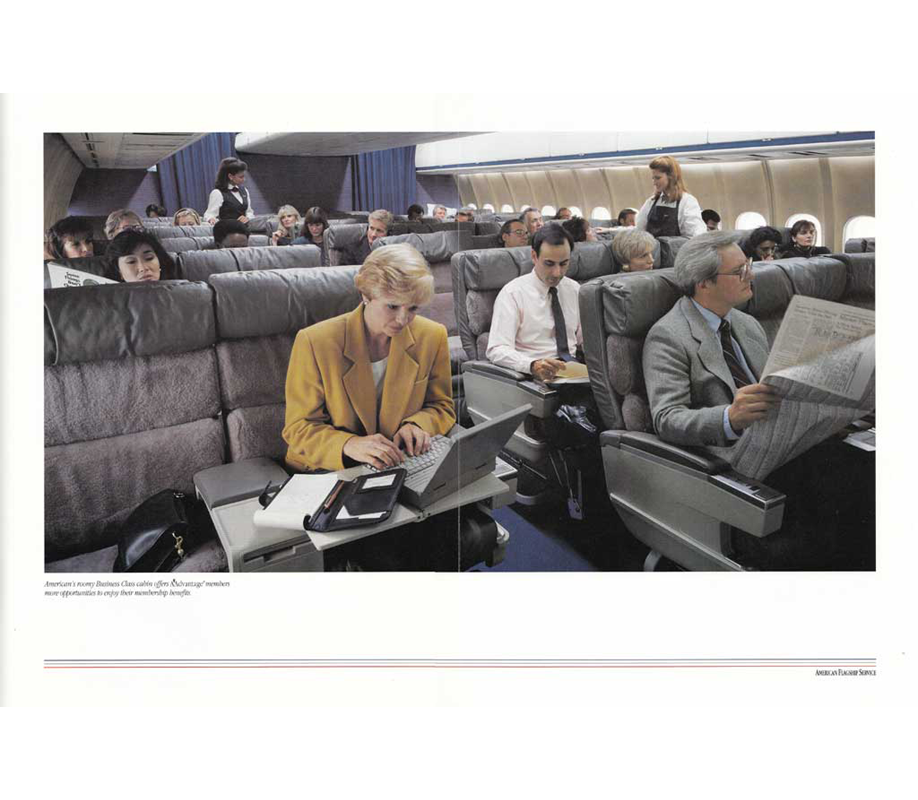 Shot of many people sitting in wide comfortable Business Class seats, working.