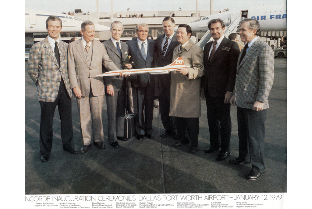 Officals standing with model fo Braniff Concorde