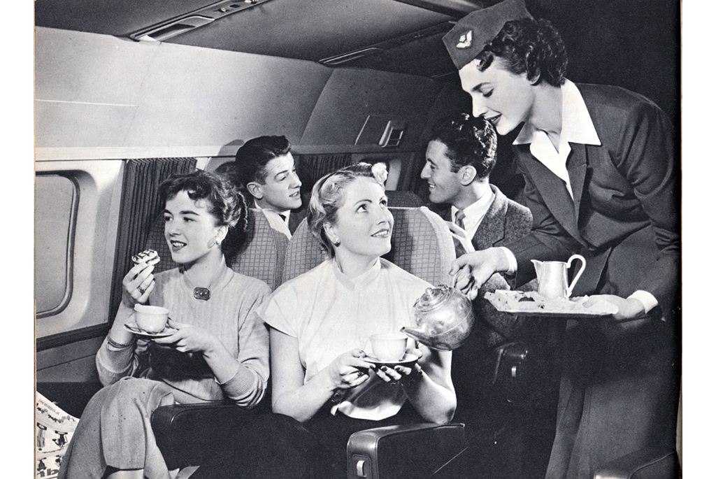 Interior of Convair 340 with people being served