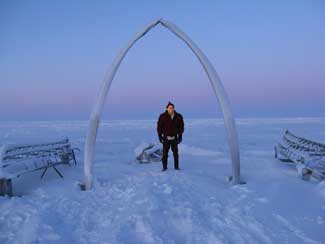 Howie posing in between two tusks